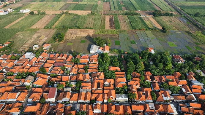 an aerial view of a small village in the countryside